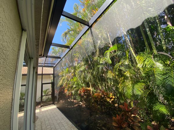 A patio enclosure in Southwest Florida keeping out the bugs and debris.